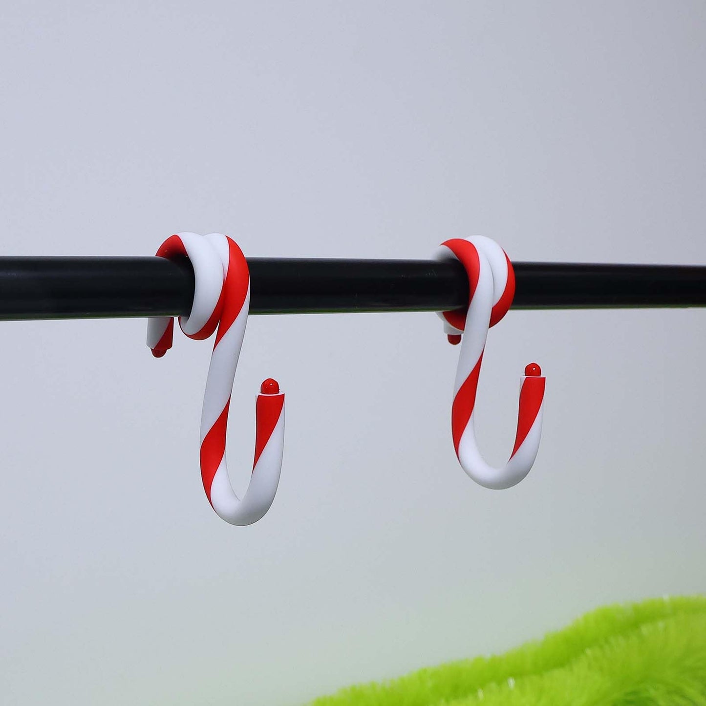 Tixiquns Bendable Stocking Holders for Mantle, Set of 4 Christmas Hooks Fireplace Stocking and Garland Hanger for Mantel, Non-Slip Adjustable Red and White Candy Cane Decor Xmas Decorations