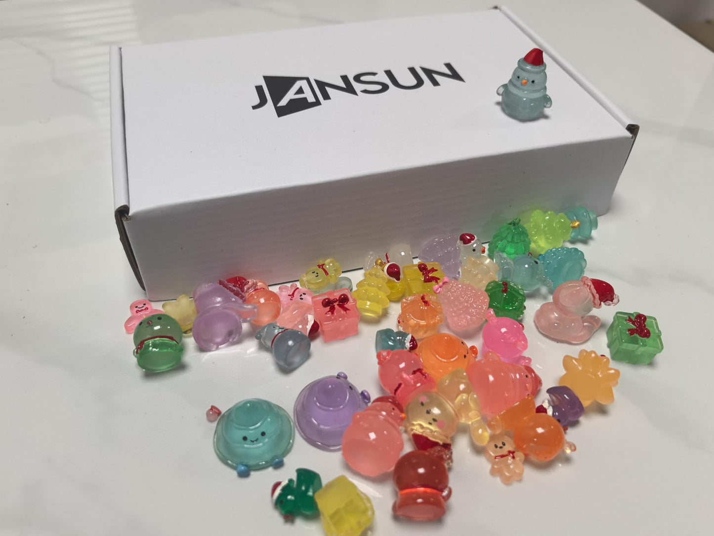 Jansun Mini Christmas Luminous Figurines, 45pcs Christmas Resin Snowman Christmas Tree Gift Box Gingerbread Man Glow in The Dark Decorations for DIY Crafts Xmas Party Gifts Garden Dollhouse Decor