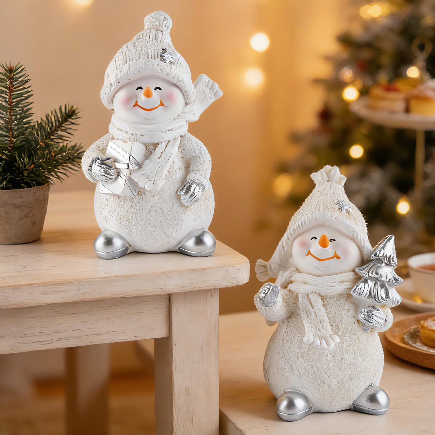 Brizoria Snowman Figurines Set of 2 White Resin Christmas Decorations with Silver Accents Winter Mantel Decor and Holiday Centerpieces for Table Home Indoor Tiered Tray Room Display