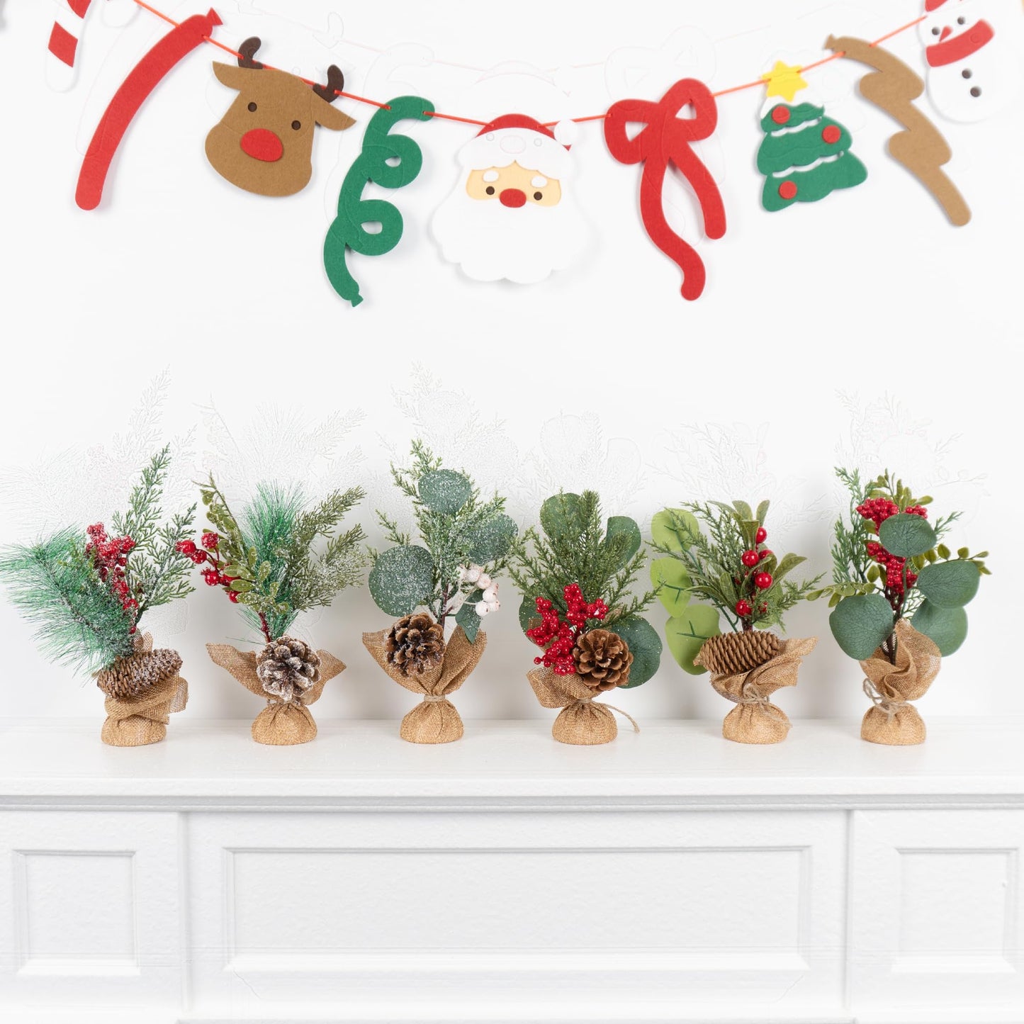 MINDELF 6 PCS Rustic Mini Christmas Tree Tabletop Set, Mixed Green Leaves, Red Berries and Pine Cones, 9 inch Artificial Trees with Burlap Bases, Ideal for Holiday Home Office Table Centerpiece